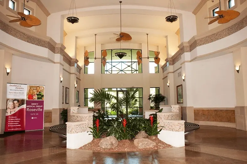 The two-storey atrium lobby of the building that held the former suite.